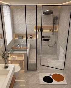 a bathroom with a walk in shower next to a sink and bathtub under a window