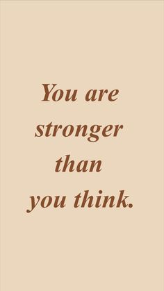 the words you are stronger than you think on a beige background with brown lettering