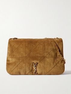 When you invest in a SAINT LAURENT bag, you take home a small piece of the maison's illustrious legacy. This 'Jamie' style has been crafted in Italy from supple quilted suede and embellished with the unmistakable 'YSL' logo. The gold-tone chain strap has a generous drop, so it'll slip comfortably over your shoulder, while the spacious interior boasts plenty of space for a continental wallet, makeup kit, tablet and water bottle. Ysl Suede, Investment Bags, Small Shoulder Bags, Suede Bag, Bag Obsession, Flat Dress Shoes, Chain Strap Bag, Fine Jewelry Designers, Saint Laurent Bag