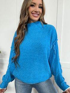 Snuggle up in cozy style with our Cuddle Season Mock Neck Long Sleeve Sweater! The sky blue color and exposed seam add an unexpected touch to this soft, stretchy sweater. Perfect for staying warm and stylish this fall. DETAILS Sky blue sweater Long sleeve Mock neck neckline Exposed seam Soft, stretchy material Perfect for the fall season SIZING Fits true to size Chelsea is wearing a size small MEASUREMENTS S/M:Bust 34-38 in, Waist 26-31 in L/XL:Bust 39-42 in, Waist 32-35 in MATERIALS AND CARE 79 Trendy Stretch Sweater With Soft Texture, Soft Knit Blue Sweater For Cold Weather, Trendy Blue Sweater For Cold Weather, Cozy Solid Color Sweater For Layering, Cozy Layering Sweater In Solid Color, Soft Knit Light Blue Winter Sweater, Cozy Blue Sweater For Fall, Blue Soft Knit Turtleneck Sweater, Blue Solid Color Sweatshirt For Fall