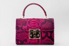 Width: 9" Height: 7" Width: 5" Strap length: 44" Queen Fuchsia Leather Handbag: Opulence Redefined Exquisite Python Leather: Indulge in the epitome of luxury with this handbag crafted from 100% genuine python leather, ensuring a superior quality and a touch of exotic elegance. Single-Compartment Splendor: Embrace the allure of simplicity with a one-compartment design that exudes modern sophistication. Opulent Gold Chain Strap: Elevate your style with the detachable gold chain strap, offering the Punk Accessories, Handbag Wallet, Wallet Accessories, Leather Handbag, The Queen, Chain Strap, Gold Chain, Leather Shoes, Gold Chains