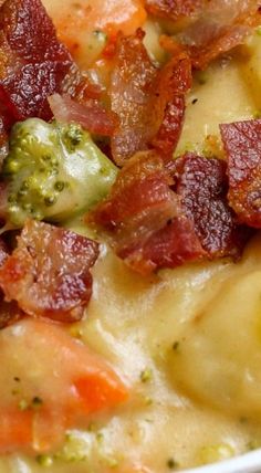 a close up of a bowl of food with broccoli and bacon on it