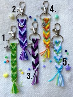 four key chains with different colors and designs