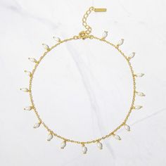 "A beautiful, and dainty freshwater pearl anklet. It's the perfect summer accessory! ~Details~ - Made of 14k Gold plated over 925 Sterling Silver (we use a thick plating, for a piece that will last year many years) - Made of freshwater pearls - Measures 9\" + 1\" Extension Chain - Lobster Clasp Closure Ships same day for quick delivery! Happy to answer any questions! :)" Adjustable White Pearl Anklets, Adjustable White Pearl Chain Anklet, White Anklets With Pearl Charm As Gift, Adjustable Dainty Pearl Anklets, Adjustable Pearl Chain Anklets, Adjustable Pearl Charm Anklets For Summer, White Pearl Anklets For Summer, Summer Pearl Anklets As Gift, Summer White Pearl Anklets