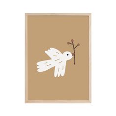 a white bird with a branch in its beak on a brown background framed art print