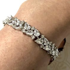 "A gorgeous boho wedding cz bridal bracelet with woodland vines leaves motifs, made of top grade clear cubic zirconia in your choice of white gold silver rhodium, yellow or rose gold plated tarnish-resistant frames. This sparkly, elegant and trendy diamond-alternative jewelry has flexible joints. Bracelet is 8mm wide. Length options: - 6\" (15cm), secures with a snap clasp - 6.5\" up to 8\" (20cm), 6\" min plus an extender, secures with a spring clasp View matching items athttps://etsy.me/2vn08h Dainty Diamond White Bracelet For Wedding, Dainty Diamond White Diamond Bracelet For Wedding, Dainty Diamond Bracelet With Sparkling Stones For Wedding, Delicate Wedding Bracelet With Diamond Accents, Dainty Wedding Diamond Bracelet With Sparkling Stones, Delicate Cubic Zirconia Wedding Bracelet, Dainty Diamond Bracelet With Accents For Wedding, Dainty Diamond Bracelet For Wedding With Accents, Dainty Diamond Bracelet For Wedding