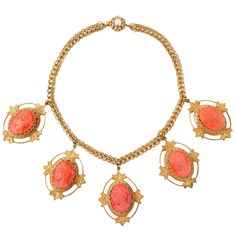 Miriam Haskell's coral glass cameo necklace set in signature Russian gilt filigree. Woven triple chain with 5 neoclassical cameo pendants set in filigree leaf frames. Length 2" x Width 1.5" Coral glass cameos. Length 15.5" chain necklace. 1950's USA. Excellent condition. Necklaces Red, Drop Necklaces, Cameo Bracelet, Necklace Leaf, Miriam Haskell Jewelry, Red Pendant, Cameo Pendant Necklace, Cameo Earrings, Red Pendants