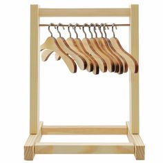 wooden clothes hangers are hanging on a rack