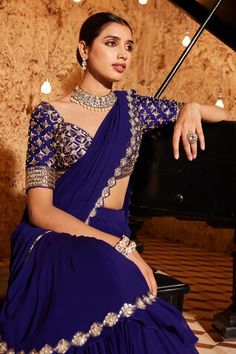 Purple pre-draped mermaid saree with sequin embroidered cut-out border and draped tiered hemline. Comes with embroidered padded blouse. - Aza Fashions Traditional Wedding Saree With Draped Sleeves, Fitted Georgette Dupatta With Draped Sleeves, Traditional Fitted Draped Blouse, Festive Pre-draped Fitted Blouse, Festive Fitted Pre-draped Blouse Piece, Traditional Fitted Dupatta With Draped Sleeves, Pre-draped Embellished Fitted Saree, Fitted Draped Blouse With Dupatta, Embellished Fitted Pre-draped Saree