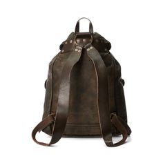 Iconic rucksack model made from lightweight supple buffalo hide. Vegetable-tanned cow leather trim. Specially hand-finished for a timeworn look. Brass hardware and distressed copper-tone rivets. Vintage Brown Leather Backpack For Daily Use, Rugged Vintage Brown Travel Bags, Rugged Brown Leather Backpack For Travel, Rugged Leather Travel Backpack, Rugged Leather Satchel Backpack For Travel, Rugged Travel Bag With Leather Patch, Vintage Oiled Leather Travel Bag, Brown Rugged Leather Backpack, Rugged Leather Backpack With Leather Lining