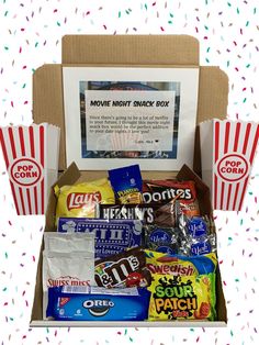 the movie night snack box is packed with snacks