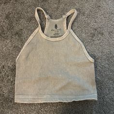 Tan Free People Tank - Never Worn - Size Xs/S Trendy Everyday Beige Crop Top, Trendy Beige Crop Top For Everyday, Neutral Cotton Tank Top, Basic Beige Tank Top For Spring, Casual Beige Tank Top For Everyday, Neutral Fitted Casual Tank Top, Casual Neutral Crop Top For Summer, Trendy Beige Cotton Crop Top, Casual Beige Cotton Crop Top