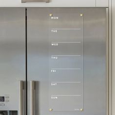 a stainless steel refrigerator with the words on it