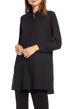 Ideal for days when comfort and ease are at a premium, this breezy popover tunic of soft crepe has side slits that provide complete freedom of movement. 32" length (size XX-Small) Band collar Long sleeves with button cuffs Side slits 100% polyester Dry clean or hand wash, line dry Imported Long Tunic Outfit, Anarkali Design, Casual Plus Size Outfits, Must Have Dresses, Tunic Outfit, Clothes For Fall, Small Band, Clothes For Spring, Long Tunic Tops