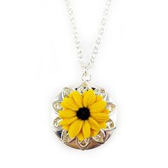 "Handcrafted Black Eyed Susan Locket Necklace featuring hand sculpted yellow flower and a filigree backdrop on a shiny silver tone locket. -Locket : 2cm (approx. 3/4 inch) silver-plated locket -Interior Locket (for photo) : 13mm (1/2 inch) -Cable Chain : Choose silver plated or upgrade to 925 sterling silver -Length : Choose 16\" or 18\" cable chain View matching collection at: https://www.etsy.com/shop/strandedtreasures/search?search_query=black+eyed+susan Flowers are hand sculpted without mold Yellow Flower Necklaces For Jewelry Making, Yellow Flower Necklaces With Birth Flower Detail, Yellow Flower Necklace With Birth Flower Detail, Yellow Flower-shaped Jewelry With Flower Decoration, Yellow Necklace With Birth Flower Pendant, Yellow Flower-decorated Jewelry Gift, Yellow Birth Flower Pendant Necklace, Elegant Yellow Flower-shaped Jewelry With Flower Decoration, Adjustable Yellow Flower Pendant Necklace