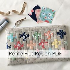 a piece of fabric next to some scissors and sewing supplies on a white surface with text overlay that says petite plus pouch pdf