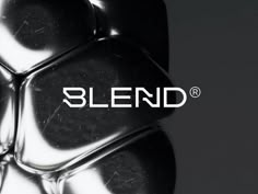 the logo for blend is shown in this black and white photo with silver cubes