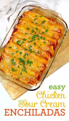 an easy chicken enchiladas recipe in a casserole dish on a cutting board