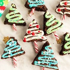 christmas brownies decorated with icing and candy canes