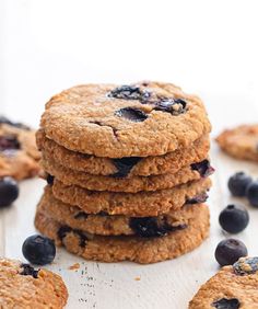 a stack of blueberry oatmeal cookies sitting on top of a table