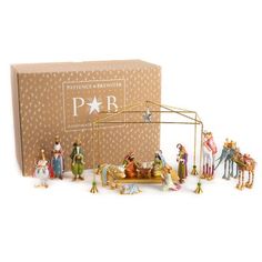 a nativity scene with figurines in a box