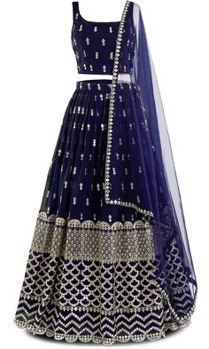 Navy never looked so fly! With mirror work that shines brighter than diamonds, this 3 piece lehenga screams elegance. Get ready to slay, because this lehenga doesn't just turn heads, it stops traffic. Designer Party Wear Skirt Set With Dupatta, Party Wear Semi-stitched Skirt Set With Traditional Drape, Festive Sequin Skirt Set For Wedding, Kundan Anarkali Set For Party Wear, Party Choli With Cutdana For Eid, Eid Party Choli With Cutdana Details, Eid Party Choli With Cutdana, Blue Kundan Lehenga For Party, Elegant Designer Zari Work Skirt Set