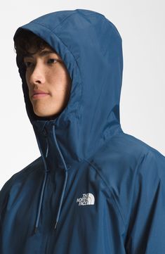 Rainy season has met its match with this hooded jacket crafted from recycled fabrics that offer breathable, lightweight protection from wind and rain. 28 1/2" length (size Medium)   Stand collar; drawcord hood   Durable water-repellent (DWR) finish   PFC-free, durable water-repellent coating is free of per- and poly-fluorinated chemicals, some of which can be harmful to the environment   Secure zip pocket holds cash or key   Lined   100% recycled nylon   Machine wash, tumble dry   Imported Hooded Raincoat With Drawstring Hood For Outdoor Activities, Hooded Raincoat With Adjustable Hood For Hiking, Hooded Raincoat With Drawstring For Hiking, Waterproof Windbreaker Made Of Recycled Polyester For Outdoor, Outdoor Waterproof Windbreaker Made Of Recycled Polyester, Windproof Hooded Jacket For Rainy Weather, Hooded Raincoat With Detachable Hood For Hiking, Outdoor Waterproof Windbreaker From Recycled Polyester, Blue Nylon Parka For Outdoor Activities