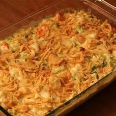 a casserole dish filled with noodles and vegetables