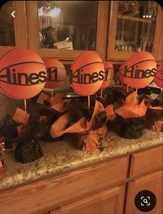 an assortment of basketballs and candy on a counter with the word minnesota in black