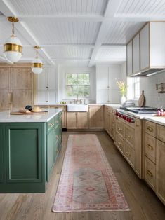 In a design world that tells you to paint your wood cabinets or ditch them altogether, we'd like you to reconsider. There are several ways to redeem your wood cabinets and make them work for your desired kitchen aesthetic. From swapping out hardware to dressing them up with a tile backsplash, we've got 10 ways to style wood kitchen cabinetry.