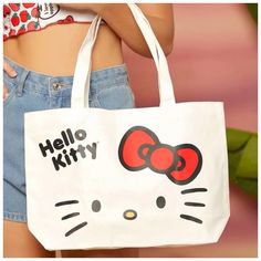 Hello Kitty Shoulder Tote. Double Handle Canvas. 100% Cotton. 16.5”L X 4”W X 11”H. Shopping Bag. Weekend/Vacation Tote. New, Never Used. Smoke & Pet Free Environment. Sanrio Tote Bag, Sanrio Tote, Hello Kitty Canvas, Fuzzy Bag, White Hello Kitty, Hello Kitty Bags, Hello Kitty Purse, Hello Kitty Bag, Reversible Tote Bag