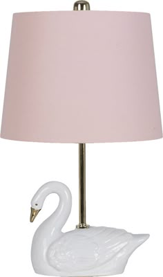 a white swan lamp with a pink shade