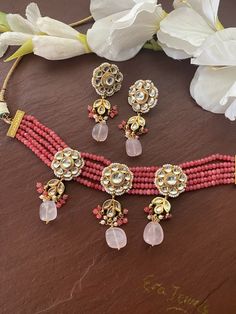 Elegant and delicate Indian Necklace With Gold Plating. Indian Bridal Kundan set One Gram Jewelry Choker Set. Very Gorgeous and pretty, fine Kundan choker necklace with matching earrings Adjustable length with help of dori (cord) Ready to ship from NJ, United States Gorgeous 24 K gold plated. Pink Beaded Kundan Necklace For Diwali, Pink Kundan Necklace For Festivals, Pink Traditional Necklace With Stone Work, Traditional Pink Necklace With Stone Work, Traditional Pink Stone Work Necklaces, Pink Round Kundan Necklace For Diwali, Handmade Kundan Choker For Wedding, Pink Kundan Choker Jewelry, Handmade Pink Kundan Necklace For Wedding