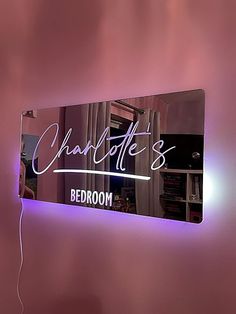 there is a sign that says charlotte's bedroom on the wall