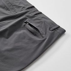 Shorts built for big travel days or off-grid exploring Gray Bottoms With Built-in Shorts For Outdoor Activities, Travel Bottoms With Built-in Shorts And Relaxed Fit, Short Hiking Pants With Side Pockets, Solid Color Hiking Shorts, 4-way Stretch Shorts With Pockets, 5-inch Inseam, Outdoor 4-way Stretch Bottoms With Pockets, 4-way Stretch Shorts With Pockets And 5-inch Inseam, Outdoor Bottoms With Pockets And 4-way Stretch, Gray Cargo Shorts For Outdoor