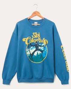 Ski Colorado Flea Market Fleece | Junk Food Clothing Blue Sweatshirt For Outdoor Activities In Fall, Cozy Winter Sweatshirt For Outdoor Activities, Winter Sports Sweatshirt, Sporty Sweatshirt For Winter Sports, Midweight Sweatshirt For Winter Hiking, Blue Retro Winter Sweatshirt, Midweight Sporty Sweatshirt For Winter, Colorado Skiing, Ski Lodge