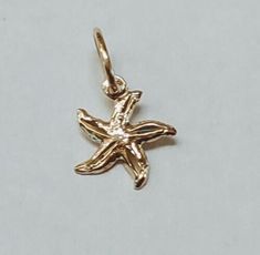 Solid 14k gold pendant. Can Include chains upon request, for affordable prices Diamond Cut finish for a radiant shine. Question? Please don't hesitate to contact me. *Wholesale* Wholesale: The more you buy, cheaper goes the price. 14k Yellow Gold Starfish Jewelry, 14k Gold Starfish Charm Jewelry For Gifts, 14k Gold Jewelry With Starfish Charm For Gift, Gold Starfish Charm Jewelry, 14k Gold Starfish-shaped Jewelry, Gold Starfish Charm Jewelry In 14k Gold, Gold Jewelry With Starfish Charm In 14k Gold, Gold Sterling Silver Jewelry With Starfish Charm, 14k Gold Jewelry With Starfish Charm