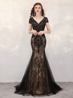 This appealing set includes a beaded high neck line and also illusion corset decorated with bead job. The back of this dress showcases an open back with a criss cross closure and also is completed with a significant mermaid skirt. Black Lace Evening Dress, Backless Formal Dresses, Gala Gown, Cap Sleeve Gown, Black Mermaid, Dresses 2020, Lace Evening Dresses, Black Prom Dresses, Glam Dresses