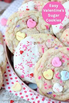 valentine's day cookies with sprinkles and hearts in a bowl