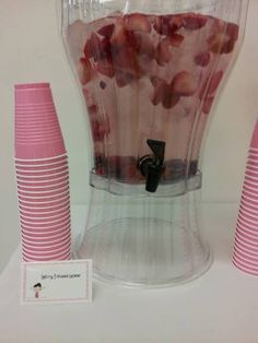 a blender filled with lots of pink strawberries