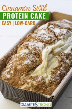 cinnamon swirl protein cake in a pan with the words easy low carb on top