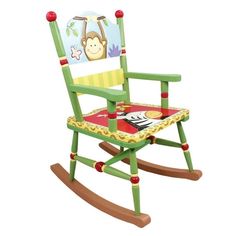 a green rocking chair with a monkey on it's back and the seat up