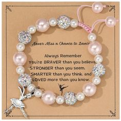 a bracelet with beads and charms on it that says never mess a chance to dance