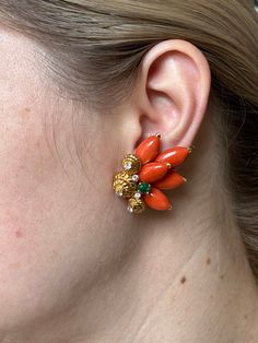 Gorgeous vintage, circa 1970s, 18k gold brooch and earrings set, featuring approx. 1.40ctw VS/H diamonds, emeralds and coral. DESIGNER: Not Signed MATERIAL: 18k Gold GEMSTONES: Diamond, Emerald, Coral DIMENSIONS: Brooch is 63mm x 52mm, Earrings - 37mm x 32mm. MARKED/TESTED: 18k. WEIGHT: Earrings - 38 grams; Brooch - 54.9 grams. CONDITION: Previously Owned, Excellent Condition. Gold Set With Jhumka, Earings Design Indian, Coral Indian Jewellery, Corals Indian Jewellery, Earring Studs Gold, Designer Gold Jewellery, Coral Jewelry Set Kameswari Jewellers, Corals Jewellery Indian, Coral Jewelry Indian Gold Earrings