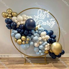 balloons are arranged in the shape of an arch with let's party written on it