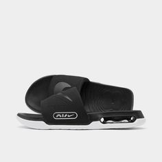 Slip-on design inspired by Nike Air Max line.Plush strap over the foot features Nike branding.Contoured design hugs the foot.Visible Air units in the heels combine with foam footbed for extra comfort.Grooved outsole for traction.The Nike Air Max Cirro Slide is imported..No matter whether you're courtside, poolside or lounging around the crib, the Men's Nike Air Max Cirro Slide Sandals are a perfect fit. Drawing inspiration from the iconic Air Max sneaker lineage and delivering all-day comfort an Nike Sport Sandals For Sports, Breathable Slide Sport Sandals For Outdoor Activities, Sporty Slides With Arch Support For Outdoor, Breathable Slide Sandals For Sports, Nike Sport Sandals With Cushioned Footbed For Outdoor, Sports Sandals With Removable Insole, Sporty Breathable Slide Sandals, Breathable Sport Sandals For Water Sports, Sporty Slide Sport Sandals For Sports