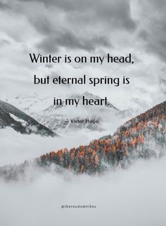 a mountain covered in fog with the words winter is on my head, but external spring is