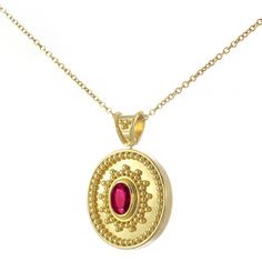 Adorn yourself with our gleaming oval gold pendant, showcasing a captivating oval deep red ruby encircled by a symphony of meticulously crafted granulations, A symbol of timeless elegance and enduring allure. 100% handmade in our workshop. Metal: 14K Gold| 18K Gold Gemstones: Oval Ruby | weight 0,39 ct Discover the art of personalization as you select your dream jewelry, choosing the perfect gemstone that resonates with your unique style.  Our dedicated team is always ready to assist, ensuring a Byzantine Oval Gemstone Jewelry, Byzantine Style Oval Gemstone Jewelry, Oval Ruby Jewelry With Engraving, Gold Oval Ruby Necklace, Oval Ruby Jewelry Engraved, Spiritual Oval Ruby Jewelry, Yellow Gold Oval Byzantine Jewelry, Yellow Gold Ruby Oval Pendant, Yellow Gold Ruby Oval Pendant Jewelry