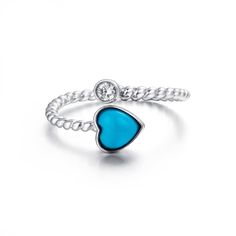 * INTRODUCTION----- This ring is made with high-quality genuine Persian blue turquoise. Inspired by the gorgeous sky blue color that's like a bright sky. The design symbolizes how love is infectious and wraps around your heart. The intense blue color looks clean and bright with little to none matrix. The design is a classic bypass style. Featuring a bezel set CZ. A great casual gift for your love or just for yourself. Baikalla gemstones are genuine stones that are highly valued for their beauty, Persian Blue, Turquoise Ring Silver, Arizona Turquoise, Best Gifts For Her, For Your Love, Elegant Necklace, Jade Jewelry, Ring Fit, Elegant Necklaces