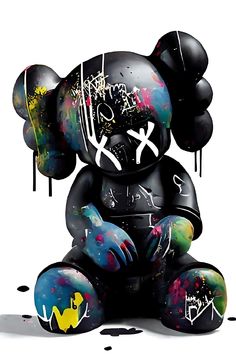 a black teddy bear with lots of graffiti on it's face and chest, sitting in front of a white background